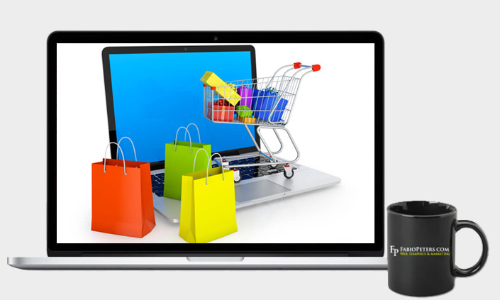 A picture of a laptop with an e-commerce shopping cart.